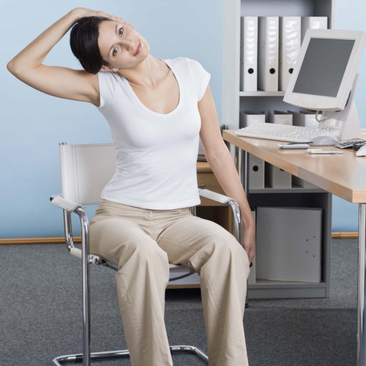 Girl Stretching in the Office