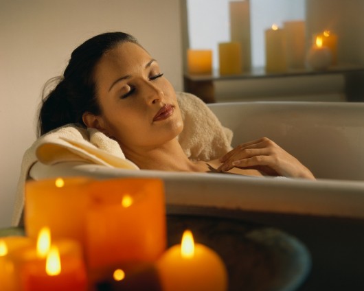 girl relaxing in a warm bath