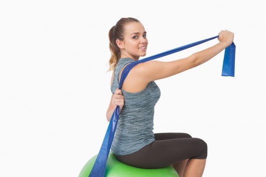 17 Resistance Band Exercises You Can Do on a Chair