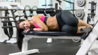 Young women take a rest at the gym