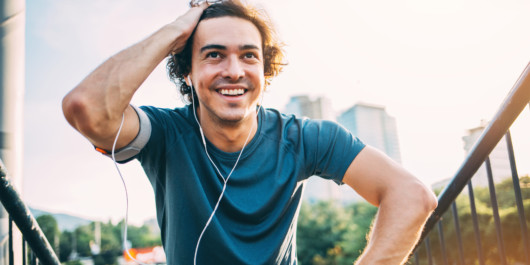 A young and self confident man is doing sport outside