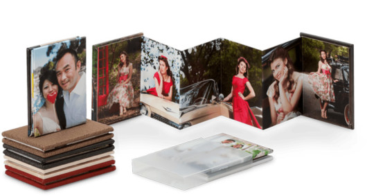 Accordion book with photos on white background