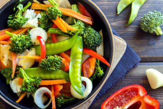 Green and red vegetable in the plate to keep healthy level cholesterol 