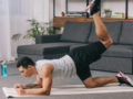 Guy is exercising at home to build muscles