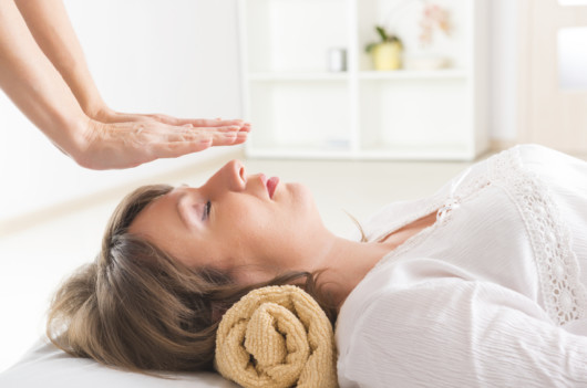 A woman is doing massage as alternative cancer treatment
