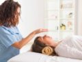 A holistic therapist is doing personalised treatment to a lady