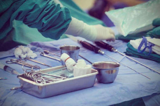 A table with surgical instruments on it