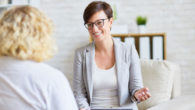 Two girls sitting in the room and discussing different ways of counseling