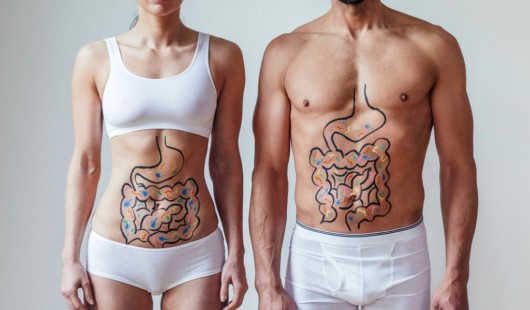 A woman and a man in underwear with gut issues