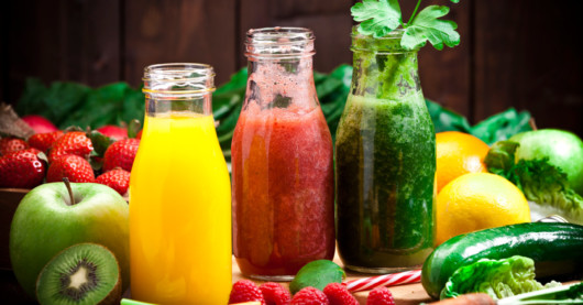 3 bottles with fruit and vegetable smoothies 