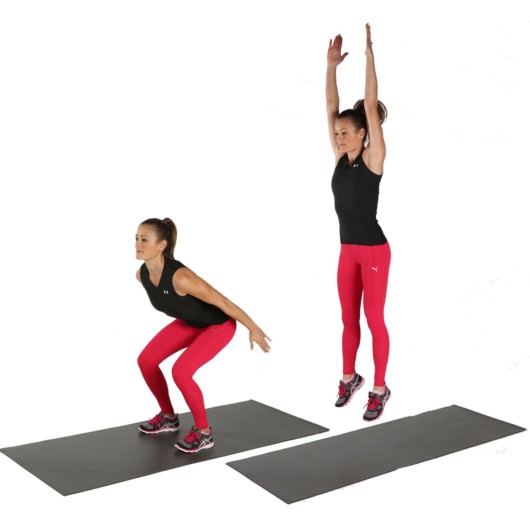 An athlete girl shows how to perform jump squat exercise