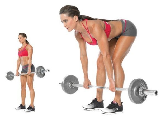 Girl with a barbell on the white background shows how to do Romanian deadlift exercise