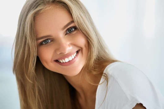 A close up photo of a beautiful girl isolated on white.