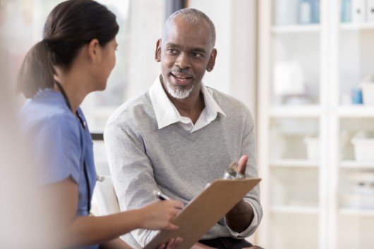 A man is asking questions about the hospice