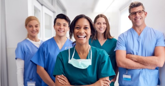 Healthcare professionals are happily smiling