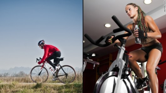 Girl is biking in the gym and outdoor comparing gym and outdoor biking